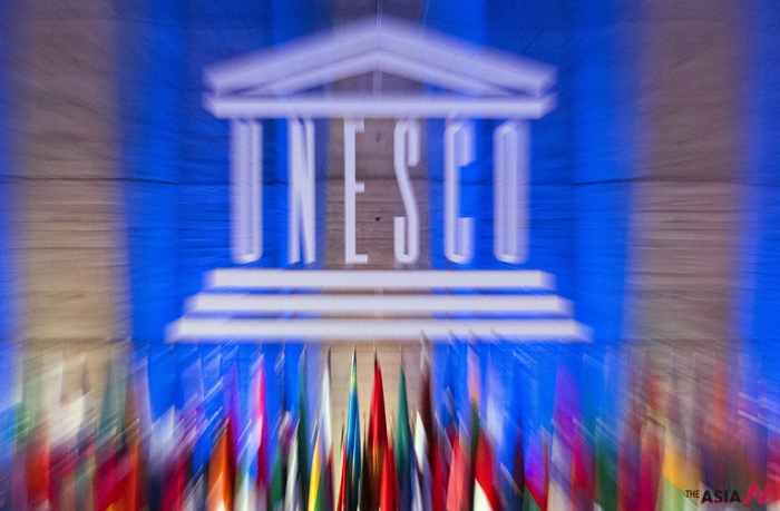 FILE - In this Nov.12, 2013 file photo, the logo of the United Nations Educational, Scientific and Cultural Organization (UNESCO) in Paris. The United States has succeeded Monday Nov. 9, 2015 in its bid to remain on UNESCO's executive board, the only way to wield American power at the world's cultural and scientific agency now that the U.S. government is no longer funding it.(AP Photo/Jacques Brinon)