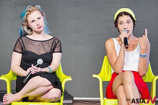 (150815) -- BUDAPEST, Aug. 15, 2015 (Xinhua) -- Russia's Maria Alyokhina (L) and Nadezhda Tolokonnikova (R), members of the Pussy Riot feminist punk rock band, talk during an interactive conversation in the Sziget Festival in Budapest, Hungary on Aug. 14, 2015. (Xinhua/Attila Volgyi)