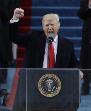 President Donald Trump pumps his fist after delivering his inaugural address after being sworn in as the 45th president of the United States during the 58th Presidential Inauguration at the U.S. Capitol in Washington, Friday, Jan. 20, 2017. (AP Photo/Patrick Semansky)